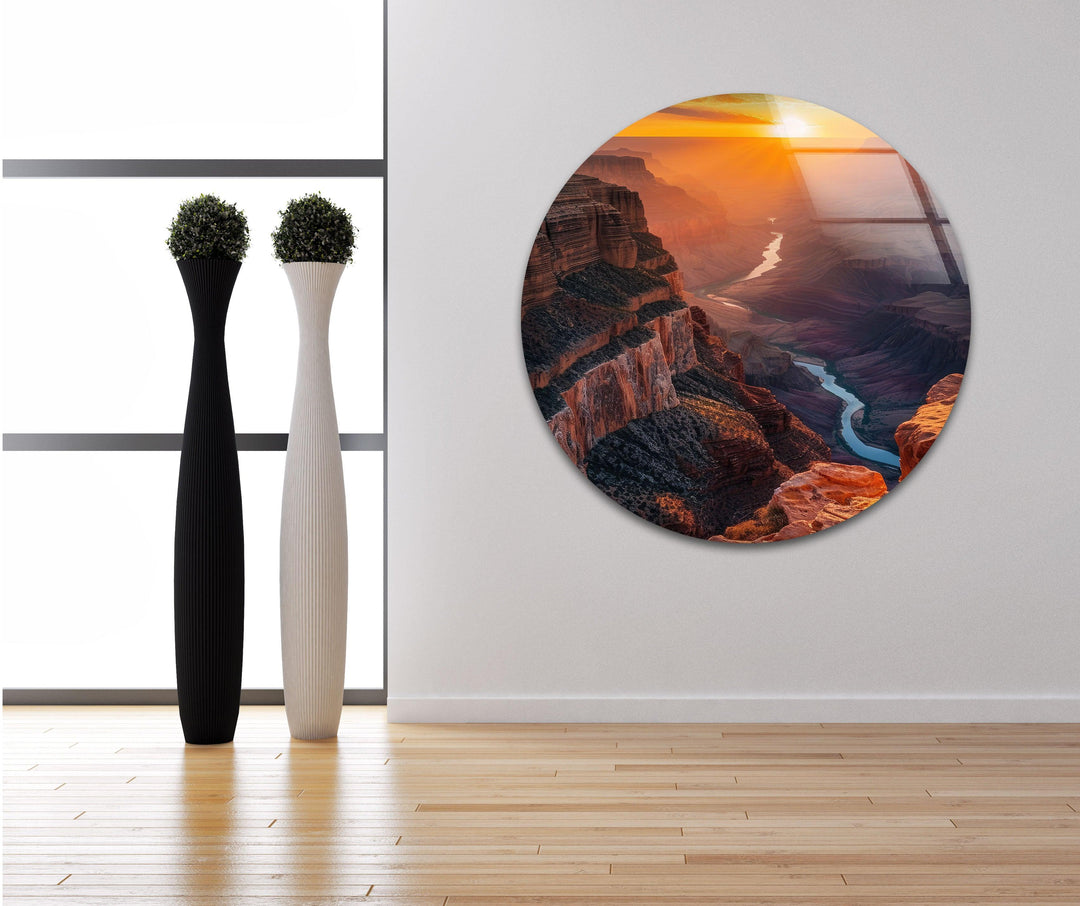Large glass wall decor highlighting the Grand Canyon’s beauty at golden hour.
