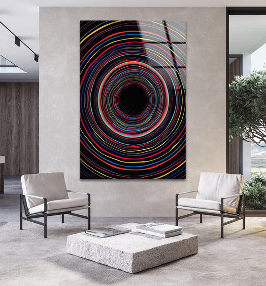 A close-up showcases the realistic detail of colorful line circles in tempered glass wall art prints, featuring vibrant concentric spirals.