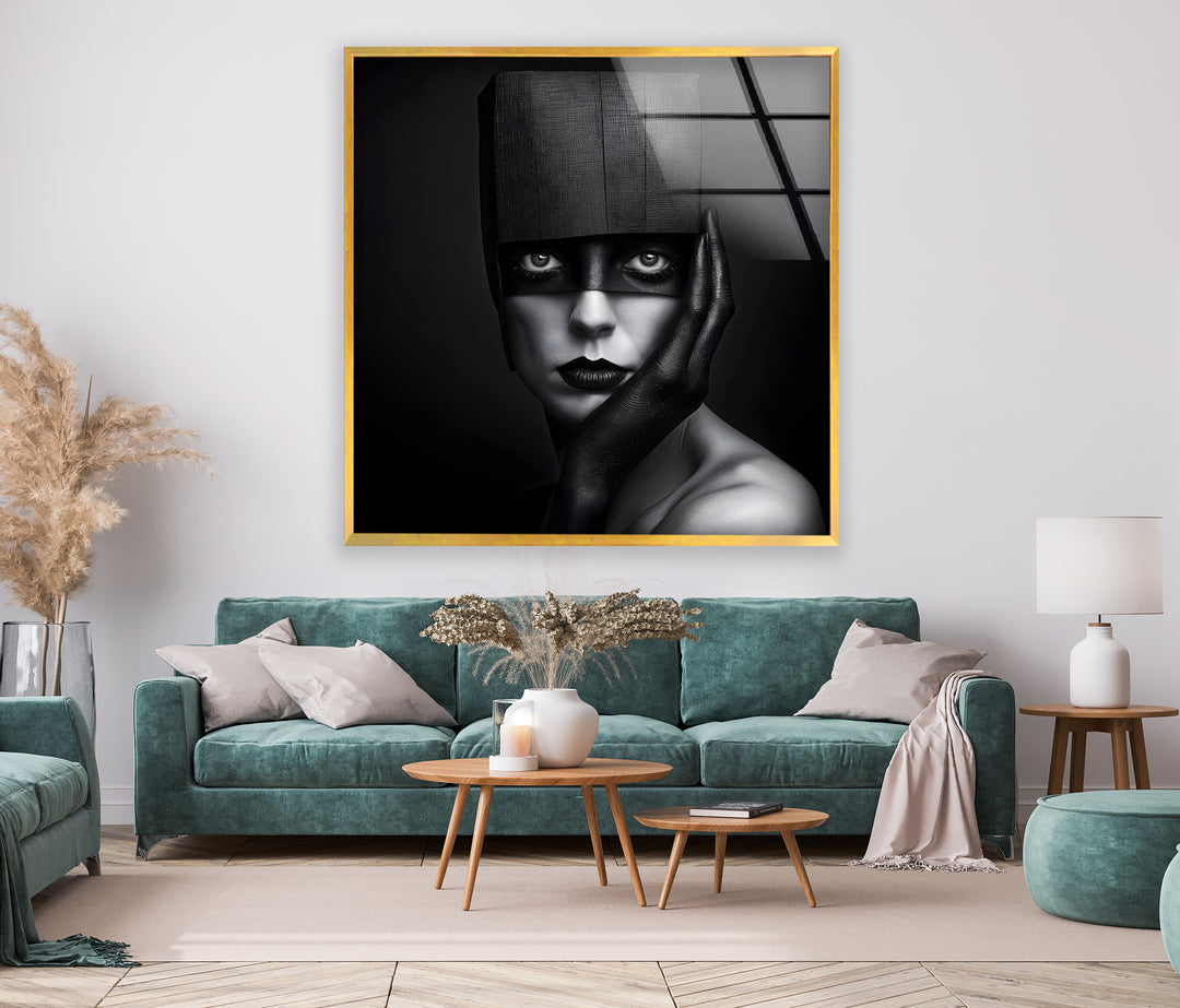 Abstract glass wall art showcasing a powerful monochrome portrait.
