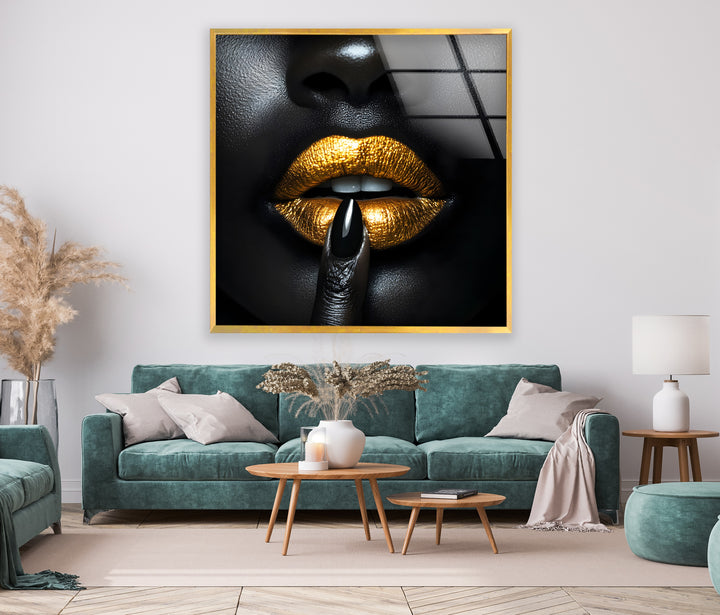 Stunning black-and-gold lips artwork on glass, blending modern beauty with artistic flair.
