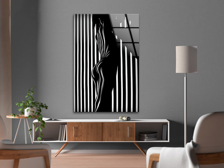 A mesmerizing abstract design in black and white, beautifully printed on glass wall art.