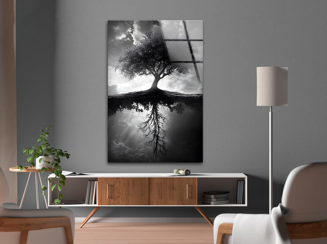 High-definition black and white glass wall art depicting a lone tree and its deep reflection.
