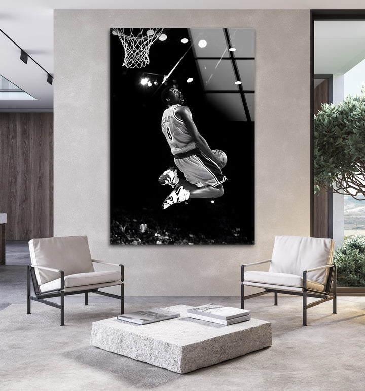 The unforgettable energy of Kobe Bryant's dunk is immortalized in this black and white glass artwork.

