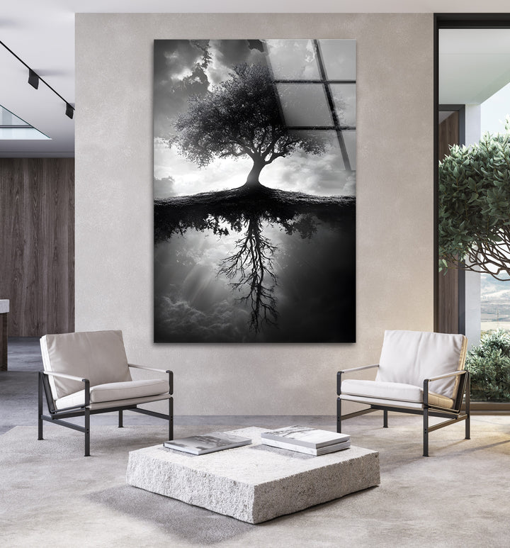 A dramatic and symbolic tree reflection captured in stunning black and white glass wall art.
