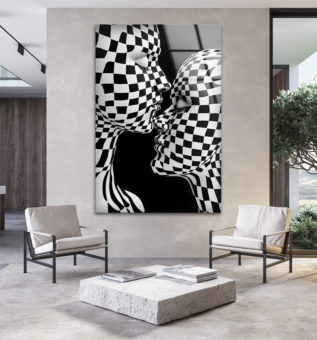 Artistic black-and-white kiss captured on glass, enhanced by a striking checkered design.

