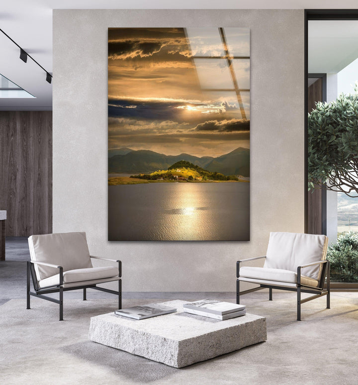 8K glass wall print of a mesmerizing sunset over a calm body of water.
