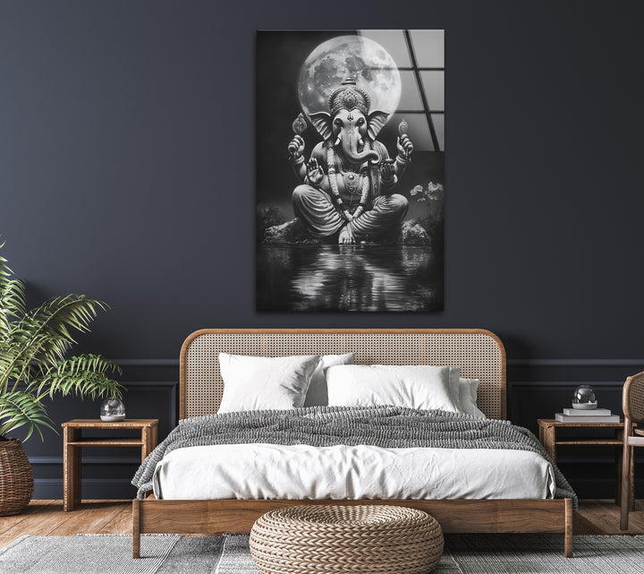 Spiritual and serene black and white glass wall art showcasing Lord Ganesha in a celestial setting.
