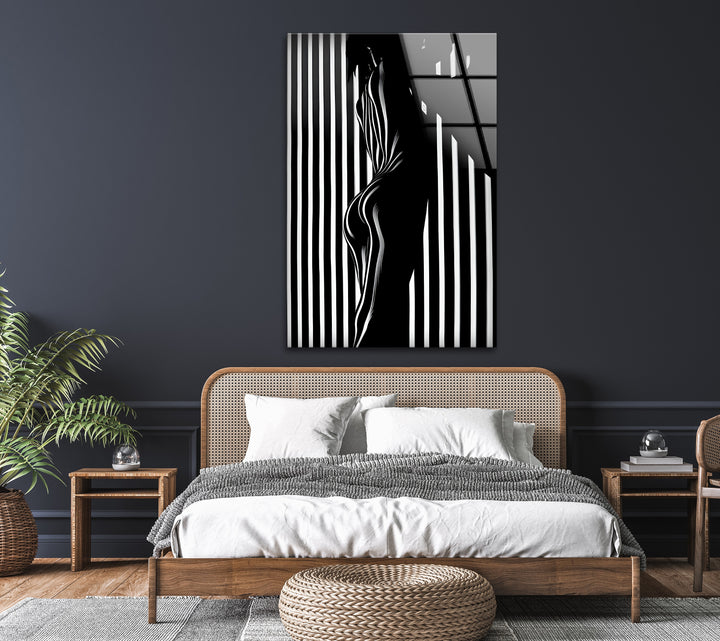 Modern and artistic black and white silhouette glass wall art, perfect for contemporary spaces.