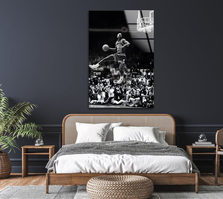 Experience the greatness of MJ in this stunning black and white artwork featuring his iconic airborne dunk.

