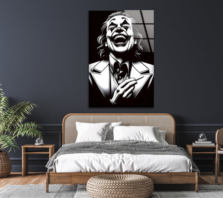 A hauntingly beautiful glass wall art showcasing the contrast between joy and chaos in a laughing clown’s face.

