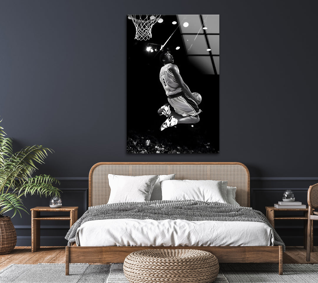 A tribute to the unstoppable force of Kobe Bryant, captured mid-dunk in black and white perfection.

