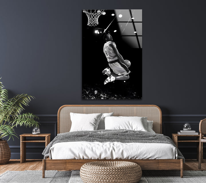 A tribute to the unstoppable force of Kobe Bryant, captured mid-dunk in black and white perfection.

