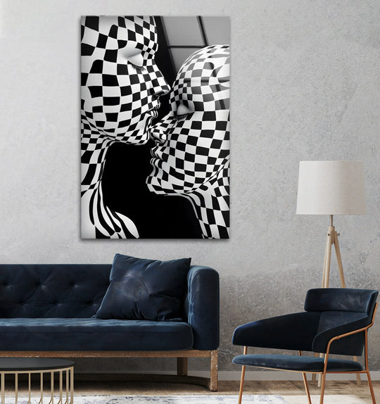 A stunning black-and-white kiss is depicted with bold geometric checkered patterns on this art from glass piece.