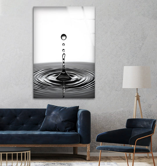 Captivating black-and-white water drop glass wall prints, showcasing a mesmerizing focal point of a splash in motion.