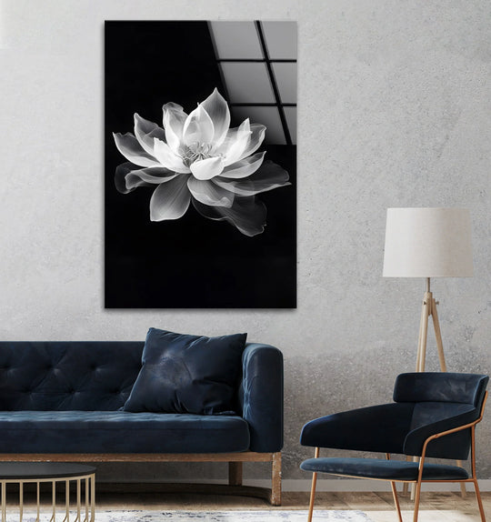 Showing the realistic detail of the lotus flower, this black-and-white wall art from glass captures an elegant, serene design.