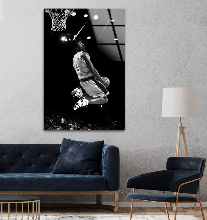 Celebrate the power and elegance of Kobe Bryant’s iconic slam dunk in this striking black and white wall art.

