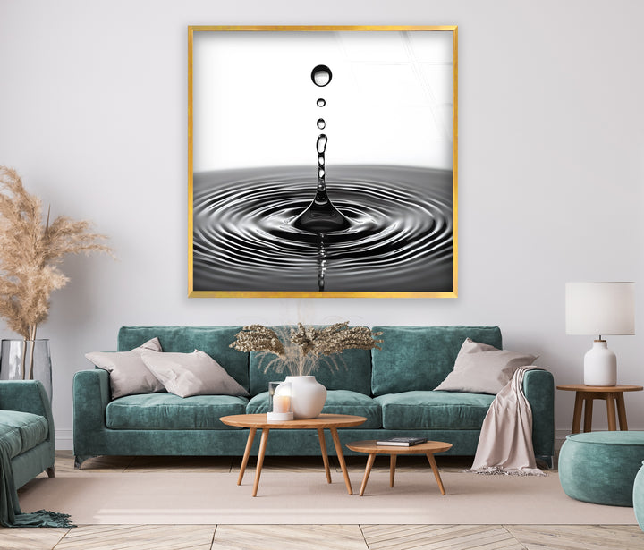 Beautiful water drop design captured in black-and-white on glass, adding simplicity and style.
