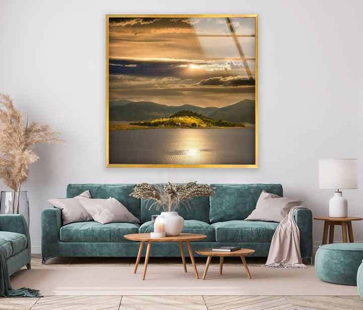 High-quality glass print showcasing rolling hills under a glowing sky.
