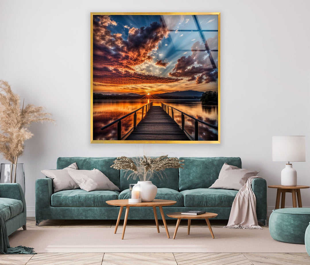 Serene lake view wall decor capturing the reflection of a dramatic sunset sky.
