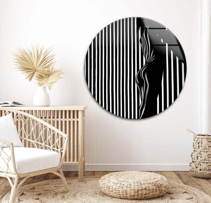 A visually striking black and white glass wall art piece with bold contrasts and artistic elegance.