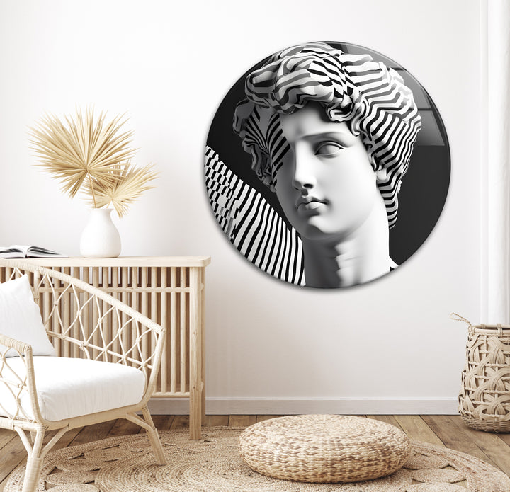 Modern Sculpture in Stripes: A bold and sophisticated piece of glass wall art featuring an abstract design of black and white stripes.
