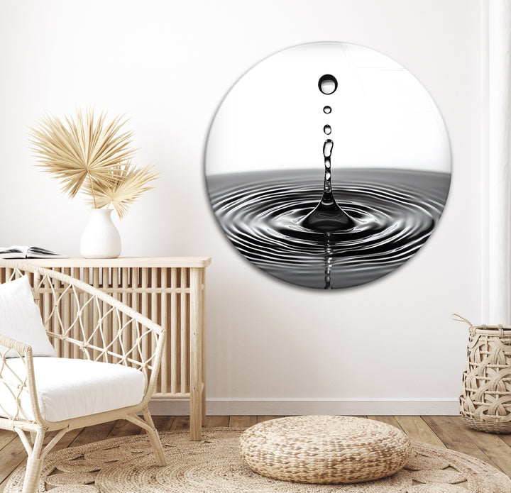 Intriguing water drop wall art in black and white, printed on high-quality glass for lasting beauty.
