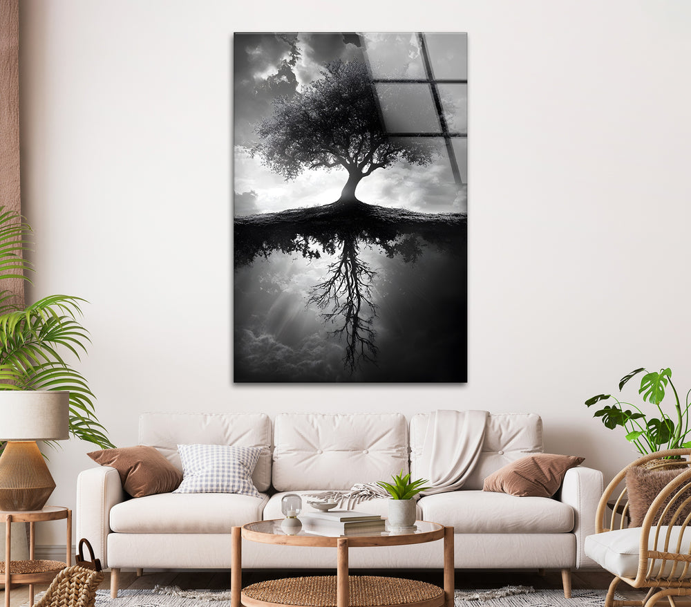 Stunning black and white glass wall art showcasing a symbolic tree with mirrored roots.
