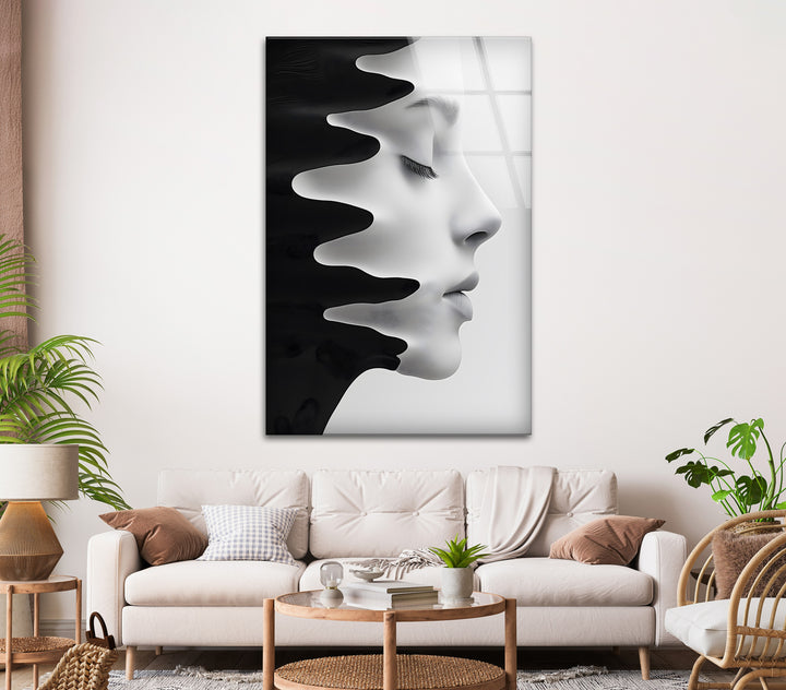 Contemporary glass wall art blending fluid motion and facial features.
