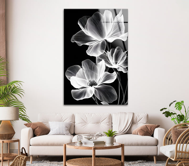 A bold monochrome flower artwork with radiant petal details, beautifully printed on glass.