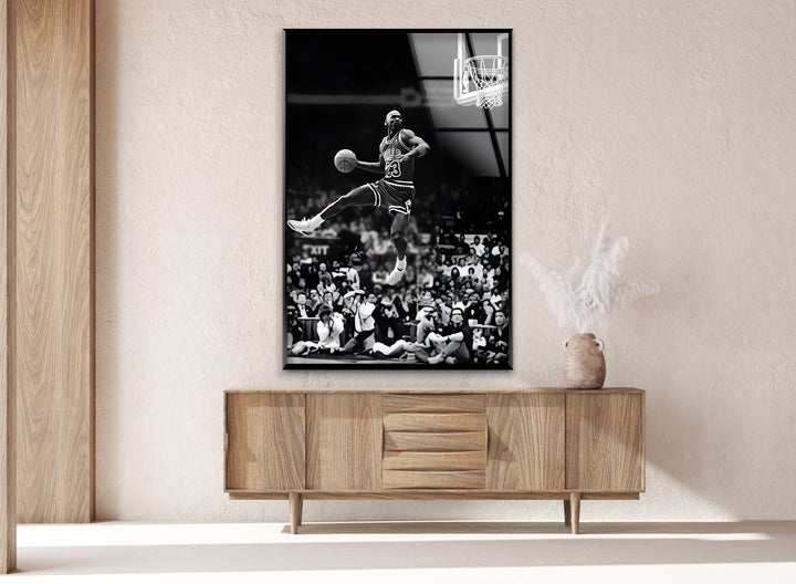 A dynamic black and white abstract art representation of Jordan’s unforgettable dunk.

