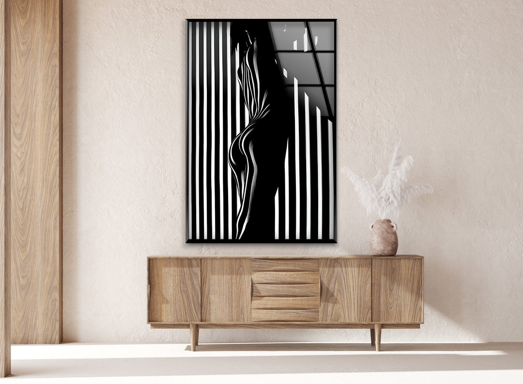 A stunning black and white artwork featuring an abstract human form on premium glass wall art.