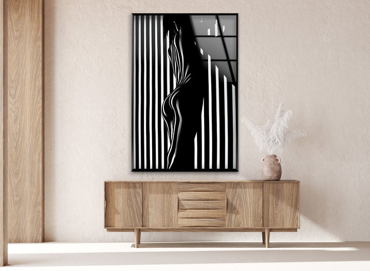 A stunning black and white artwork featuring an abstract human form on premium glass wall art.