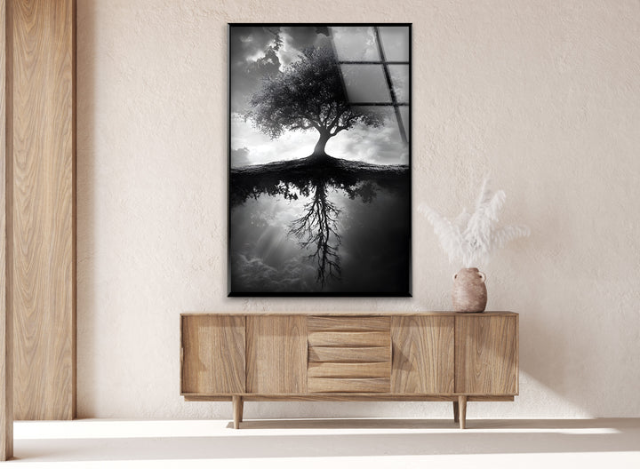 Elegant tree reflection artwork in black and white, printed on high-quality glass wall art.
