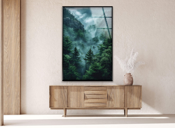 Nature-inspired wall decor featuring a deep green landscape with atmospheric fog.
