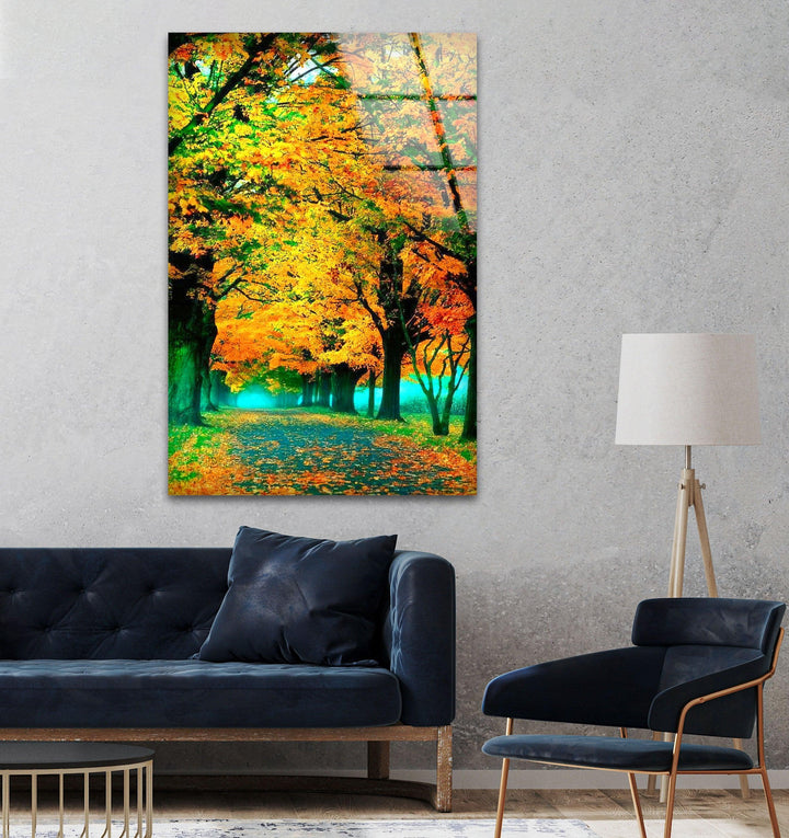A stunning fall landscape with rich orange and yellow leaves on a serene walkway.
