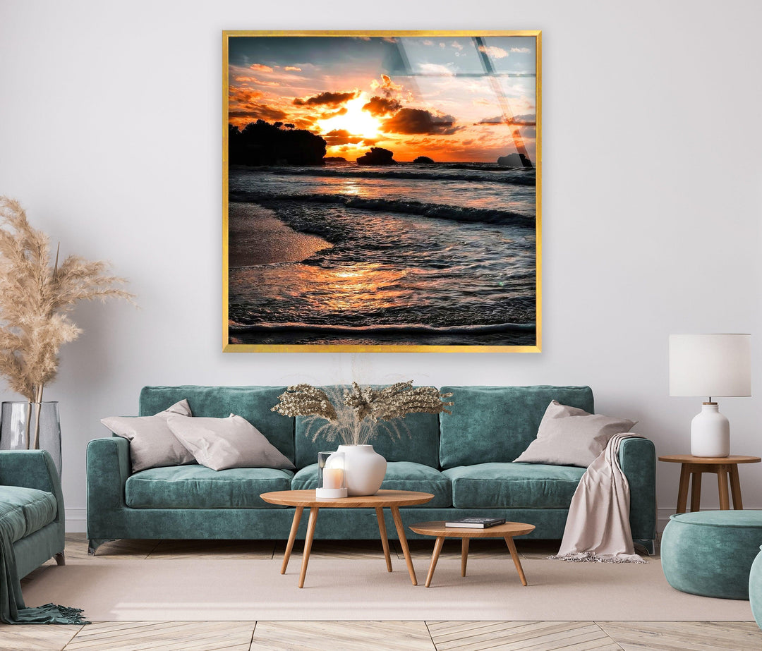 Relaxing coastal landscape featuring a golden sunset over the beach and serene water.
