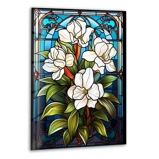 Gradient transitions between vibrant blues and greens highlight the white flower design in this exquisite stained glass art.