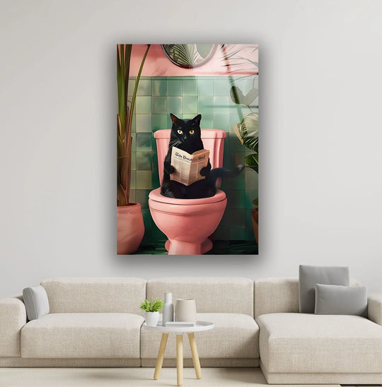 Black cat reading a newspaper on a pink toilet, creating a whimsical focal point against ample negative space.