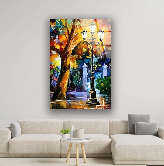 The softest element in this hanging wall art is the luminous glow emanating from the street lamps, reflecting on the wet pavement.