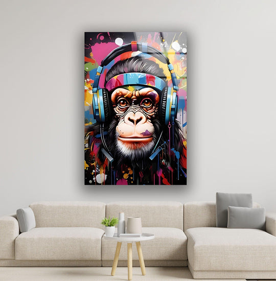 A vibrant and highly saturated glass wall art print featuring a chimpanzee wearing colorful headphones.
