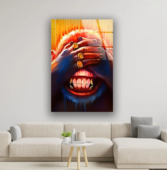 Abstract glass art features textured, dripping blue paint against a vibrant, fiery orange and yellow background, offering unique modern wall decor.