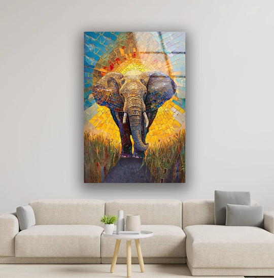 The elephant is mosaic style animal glass wall art with blue and gold tones and mosaic patterns making wildlife art a statement piece on display