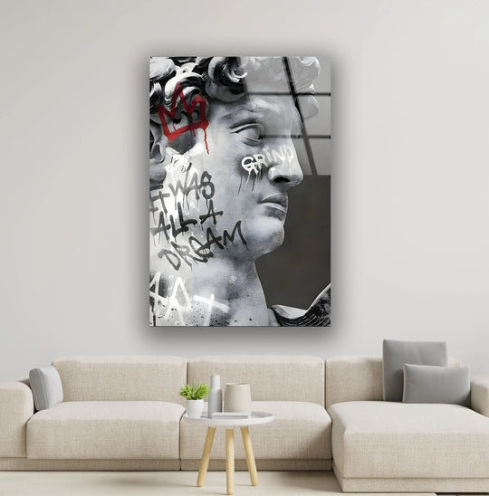 Graffiti splatters dance across the marble face, giving the cool art from glass a dynamic, rebellious sense of movement.