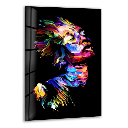 Vibrant abstract face art in bold neon hues on unique modern wall decor.