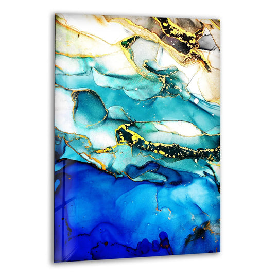 Glossy print wall art showcasing vibrant abstract swirls of deep blue, turquoise, and shimmering gold ink on glass.