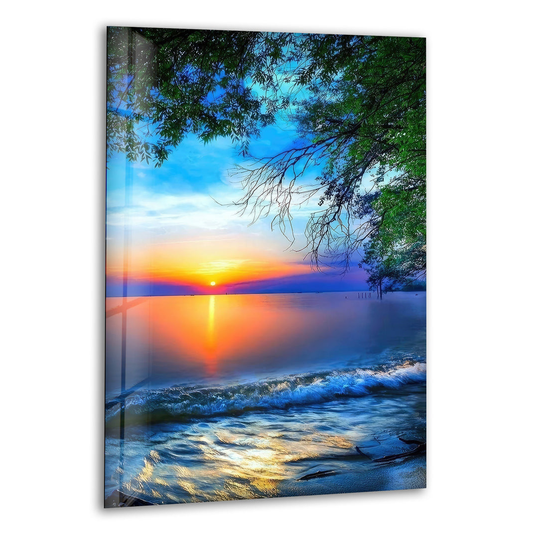 Peaceful ocean sunset with golden reflections on the water, printed on glass wall art.
