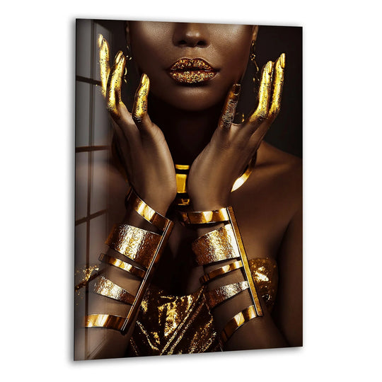 A woman adorned in shimmering gold jewelry showcases a stunning layering effect, a captivating piece of glass wall art decor.
