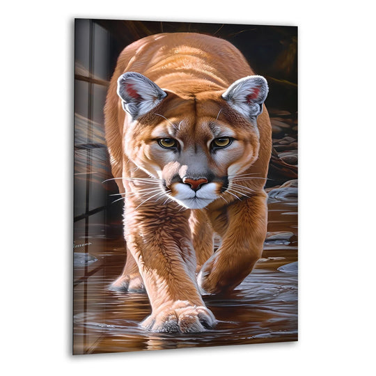 A warm, golden puma walks through cool, shallow water, creating a rich, print wall art.