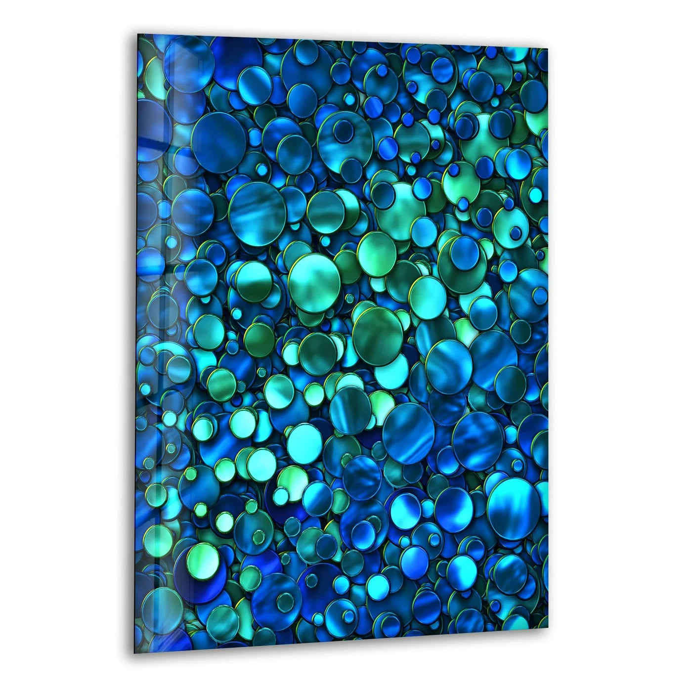 Deep blue and teal iridescent circles pop as the loudest element in this abstract glass wall art, a vibrant home decor piece.