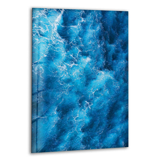 Blue ocean waves are the focus of this abstract glass wall art and a perfect modern ocean wall decor featuring premium tempered glass and coastal serenity